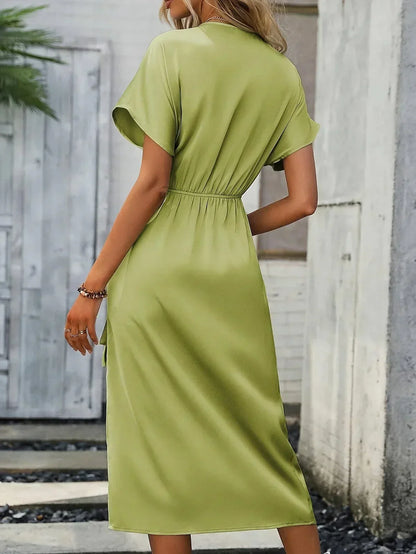 ALISSIA | Elegante wikkeljurk met verfijnde details
