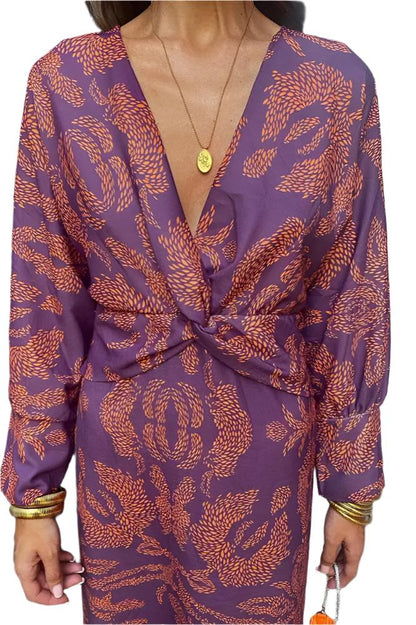 Elegante damesjurk met gedefinieerde taille en vloeiende halslijn