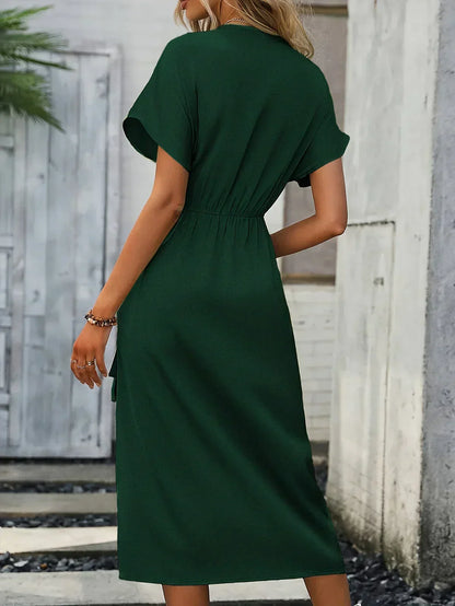 ALISSIA | Elegante wikkeljurk met verfijnde details